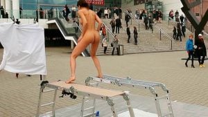 Girl with spectacular body paints completely nude in public by plopping eggs from her vagina