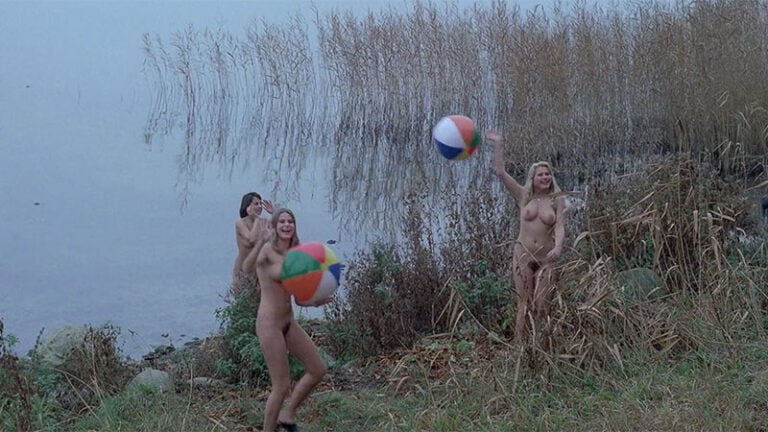 Happy thieves steal the clothes of girls playing by the lake