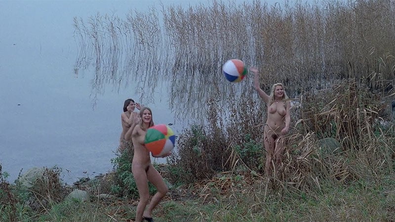 Happy thieves steal the clothes of girls playing by the lake