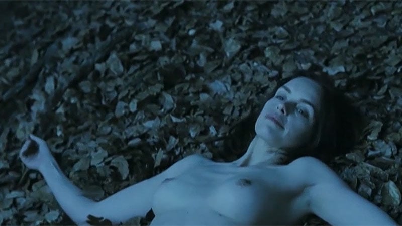 Brunette strips naked and rolls into the water, then heads home naked