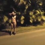 Latina girl strips on a public road and in a park