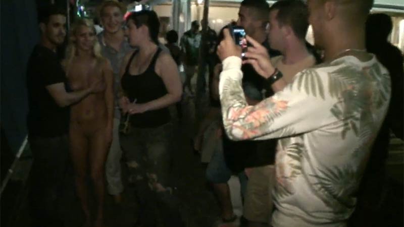 Naked voluptuous blonde takes photos with a group of men and gets groped